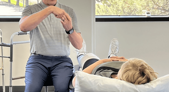 Ryan Palkoner helps to fix pain in a patient