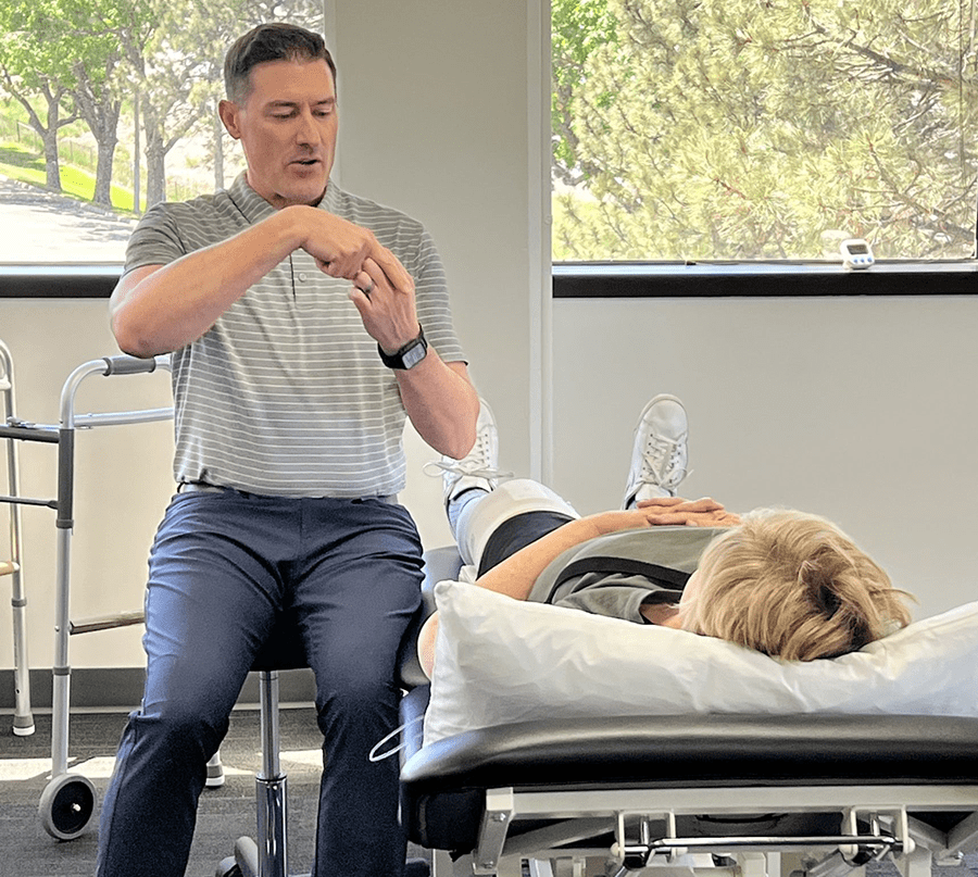 Ryan Palkoner helps to fix pain in a patient