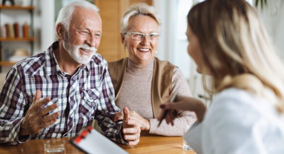 Elderly couple consulting Medicare