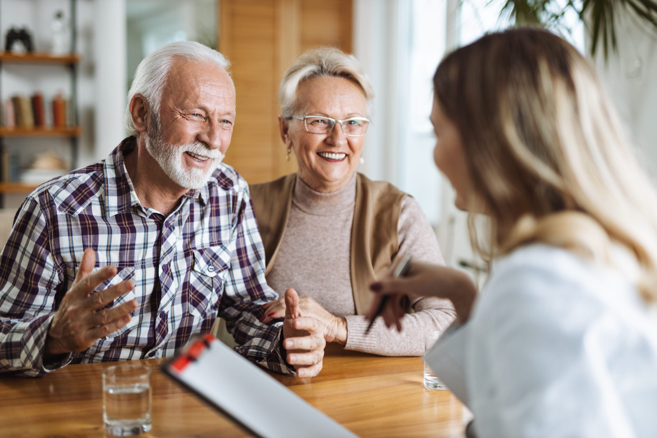Elderly couple consulting Medicare