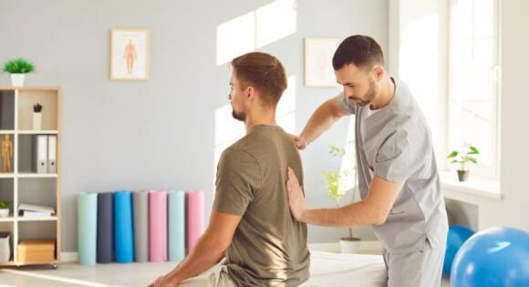 Physical therapist and a patient doing consultation